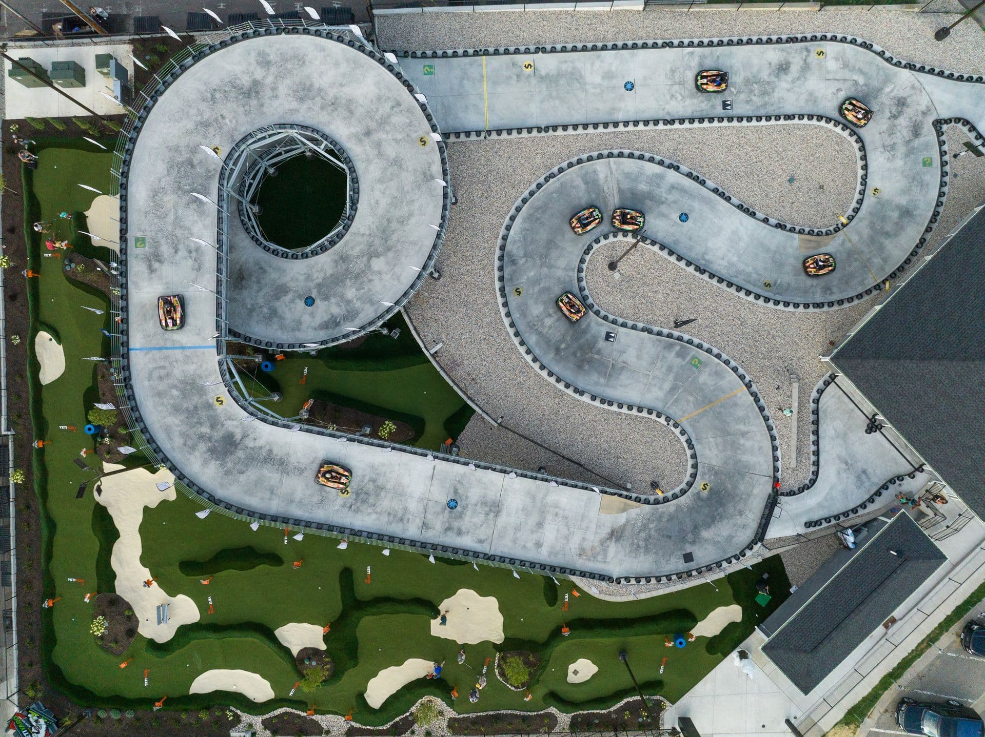 Full aerial view of the YetiYard go-kart facility and elevated track